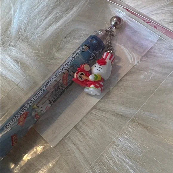 Sanrio Hello Kitty Blue Pen with Red Charm - Picture 2 of 4